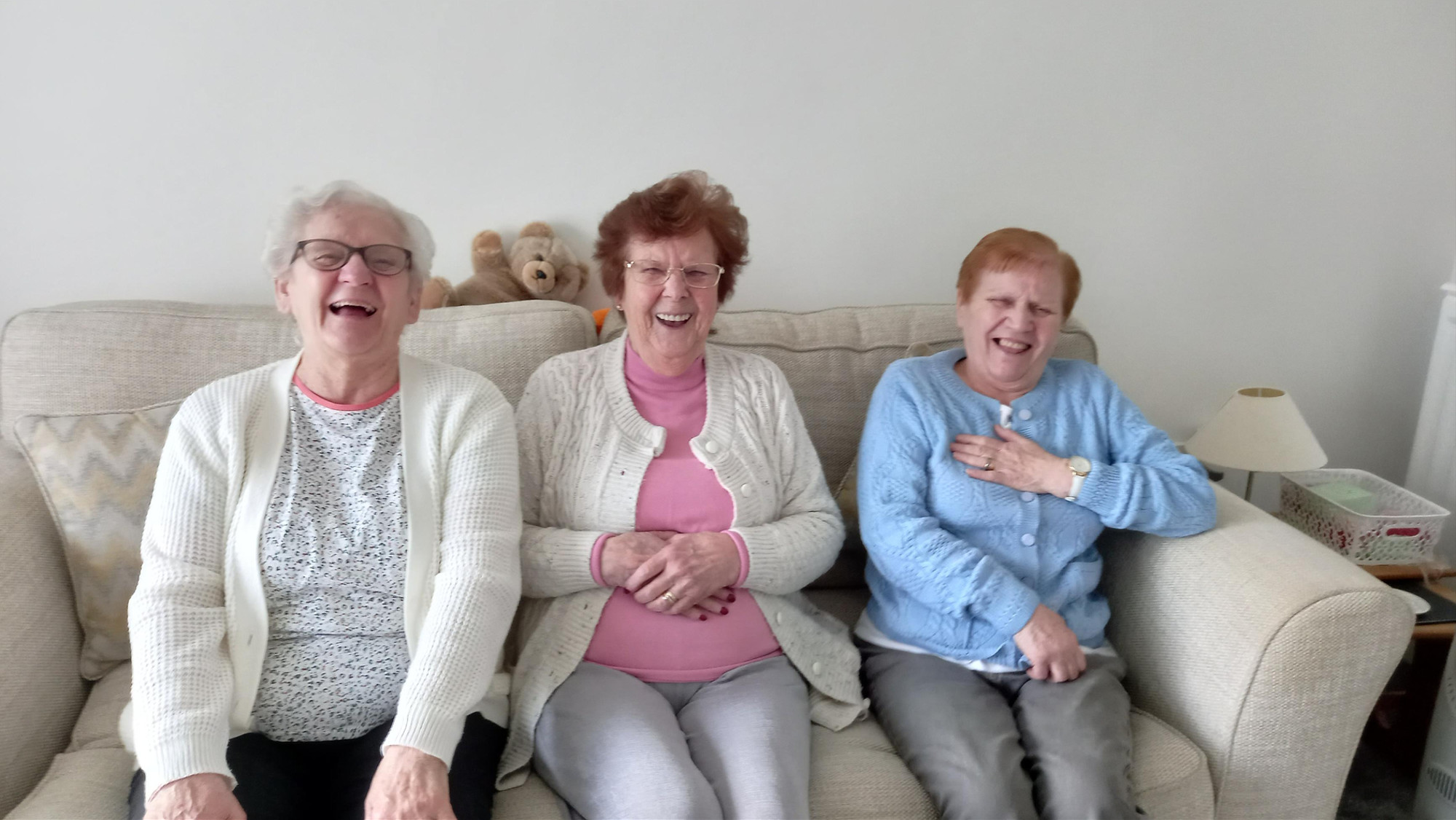 Doris, Sylvia and Anne smile after raising £800 for The Christie.