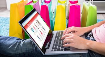 Someone shopping on a laptop