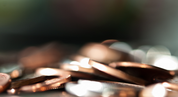 A pile of out of focus coins